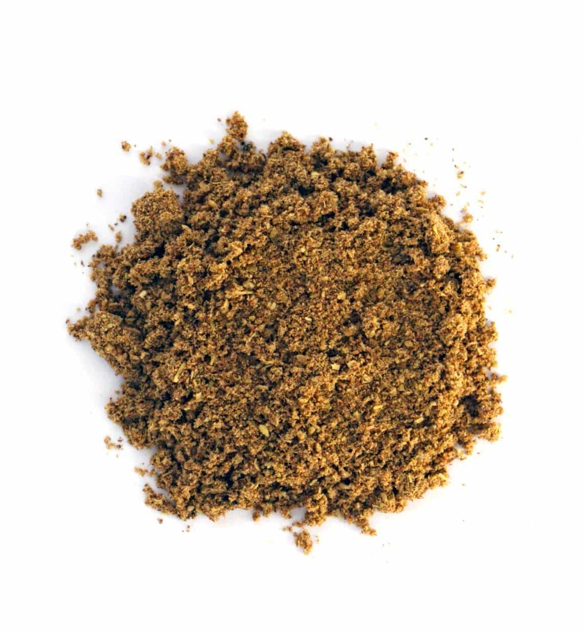 Poudre Indienne De Garam Masala Dans Un Bol Et Ses Ingrédients D'épices  Colorées. Servi Sur Fond De Mauvaise Humeur. Mise Au Point Sélective